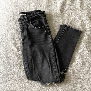721 Levi’s Black Distressed Skinny Jeans